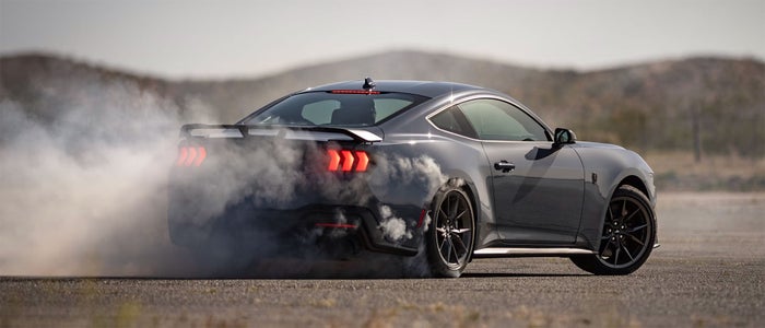 Mustang peeling out